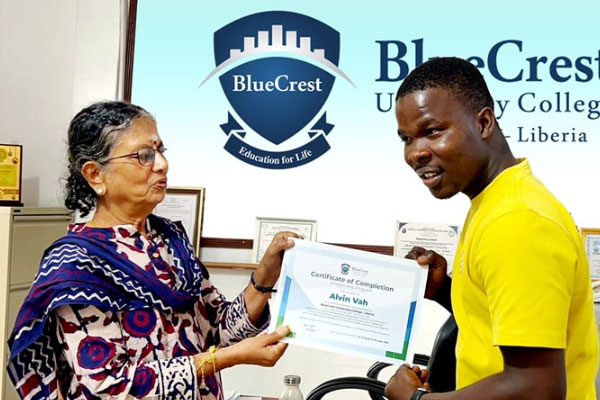 BlueCrest intern receiving certificate