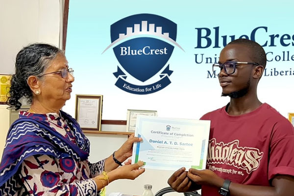BlueCrest intern receiving certificate